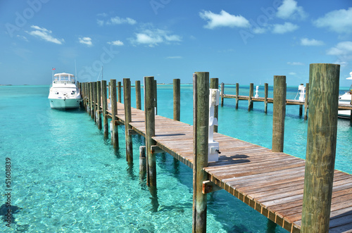 Yacht at the wooden jetty. Exuma, Bahamas © HappyAlex