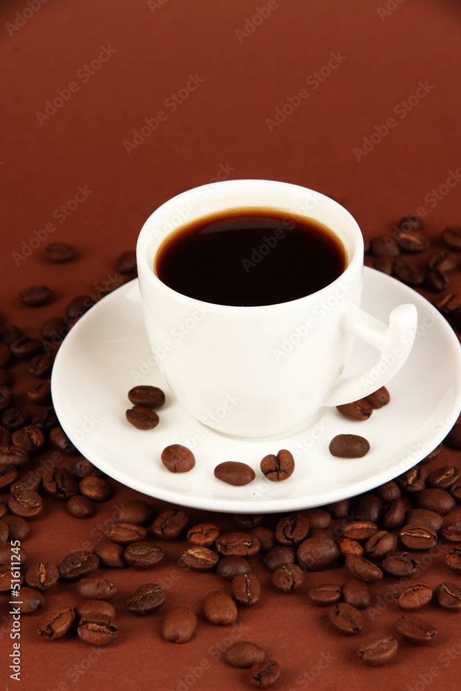 Cup of strong coffee on brown background Cup of strong coffee on brown background