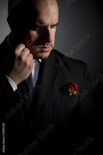 Slika na platnu Portrait of man, godfather-like character.