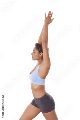 Young woman shows proper Yoga technique.
