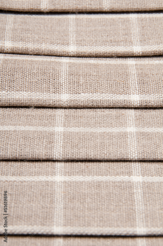 Fototapeta premium Background of linen. Figure in the cell.