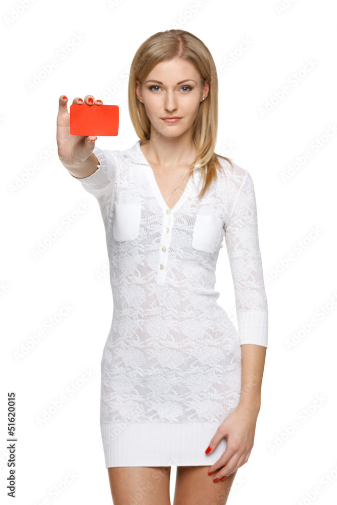 Woman in white dress holding empty credit card Woman in white dress holding empty credit card