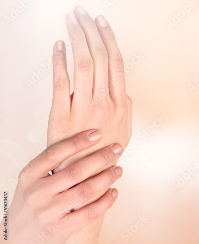 Beautiful woman hands isolated on a white background