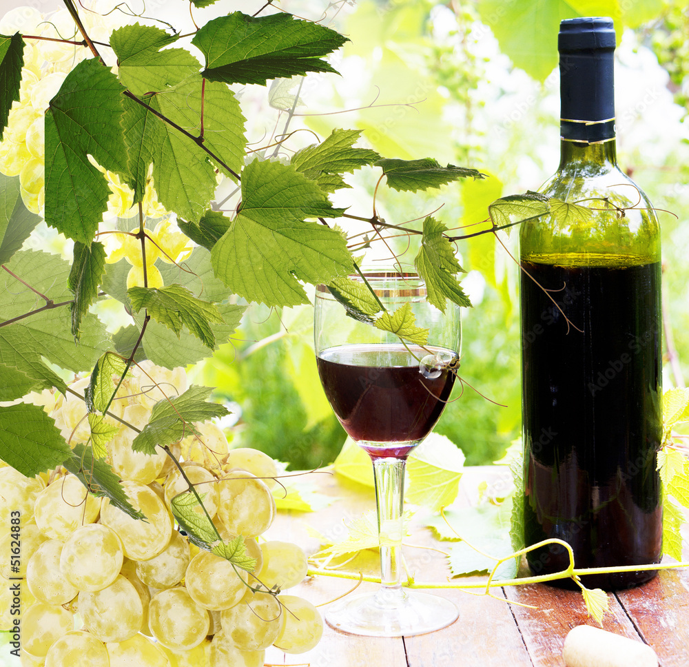 Naklejka premium Bottle young wine and ripe grape.Nature background