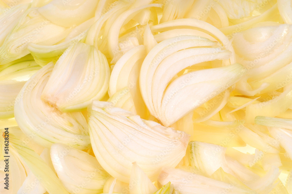 Gros plan sur des oignons coupés Gros plan sur des oignons coupés