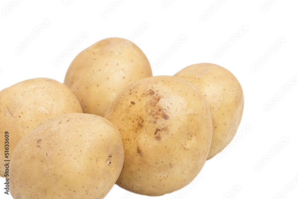 Fresh potatoes on a white background Fresh potatoes on a white background