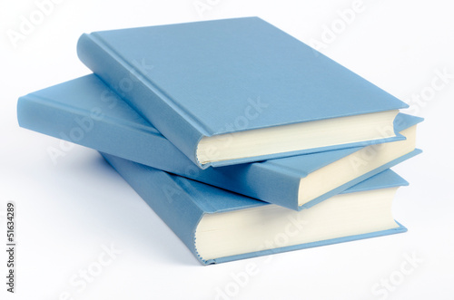 Three blue books on a white background