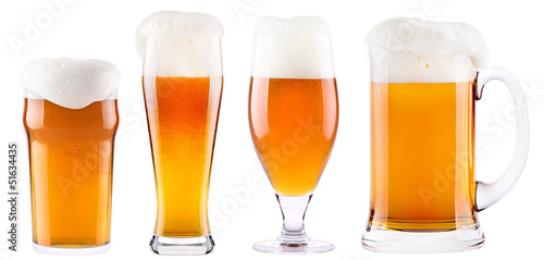 Frosty fresh beer collection with foam isolated