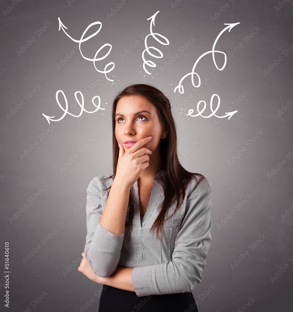 Young woman thinking with arrows overhead Young woman thinking with arrows overhead