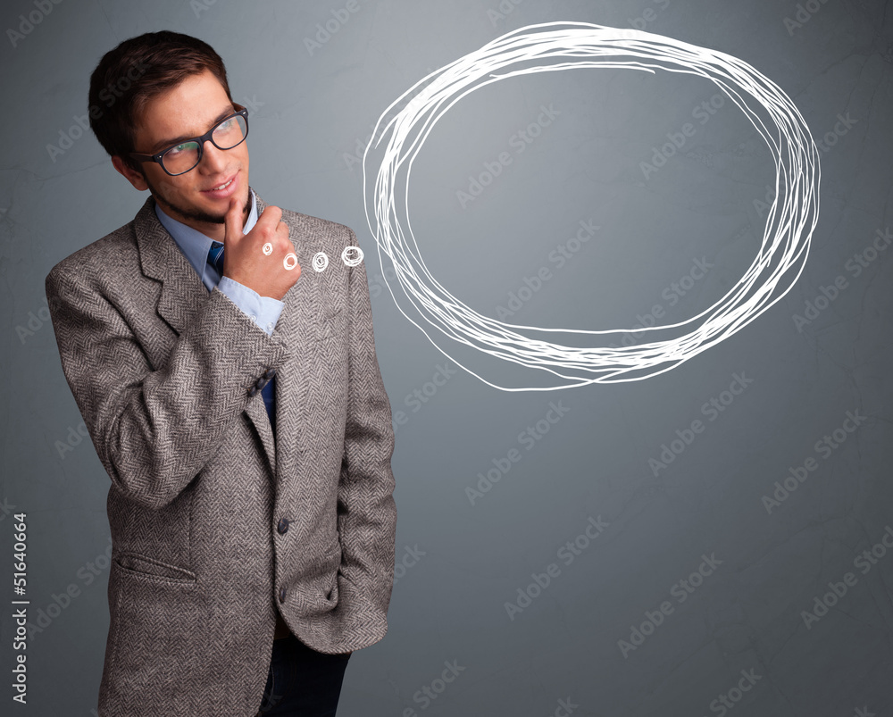 Good-looking man thinking about speech or thought bubble with co Good-looking man thinking about speech or thought bubble with co