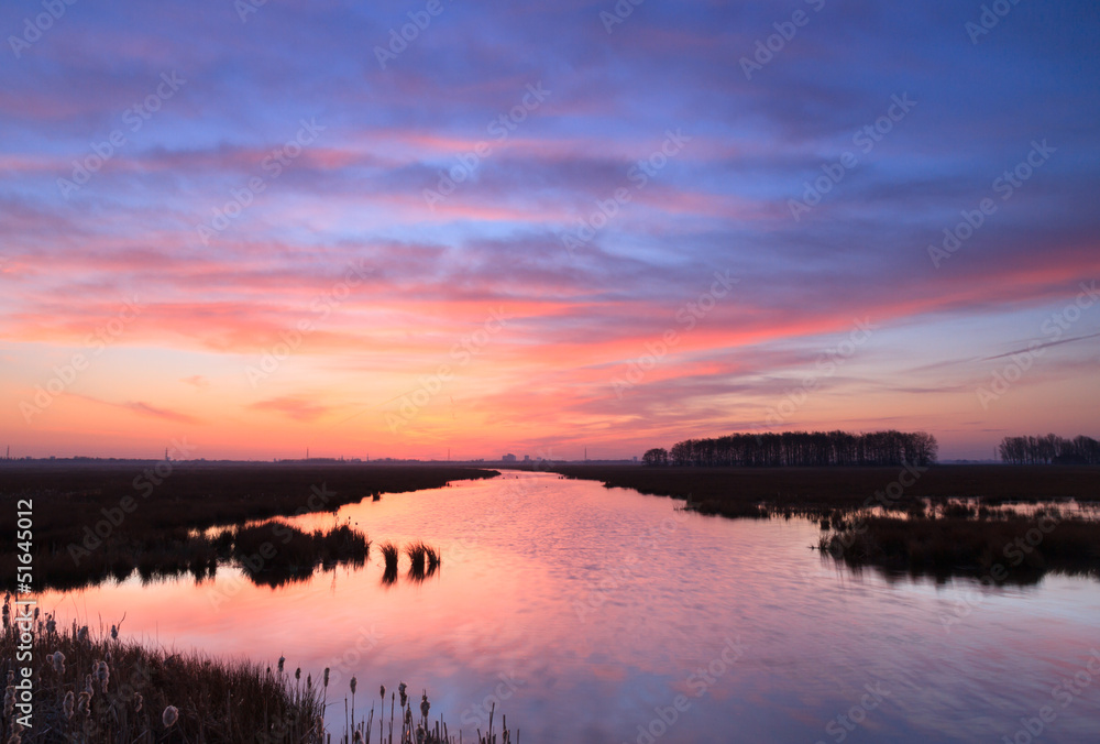 Fototapeta premium Tranquil riverside sunrise