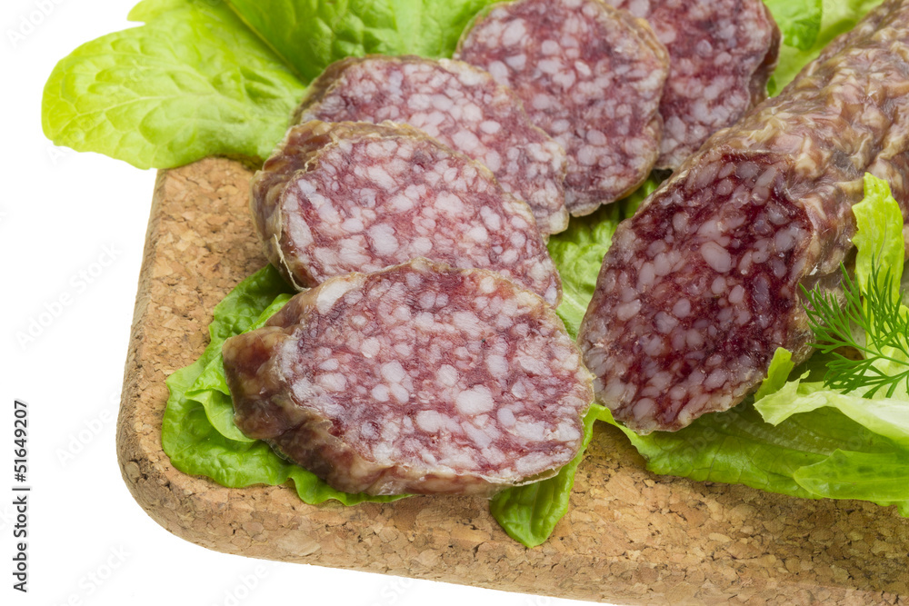 Salami with rosemary, salad and tomatoes Salami with rosemary, salad and tomatoes