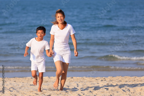 Asian family on beach