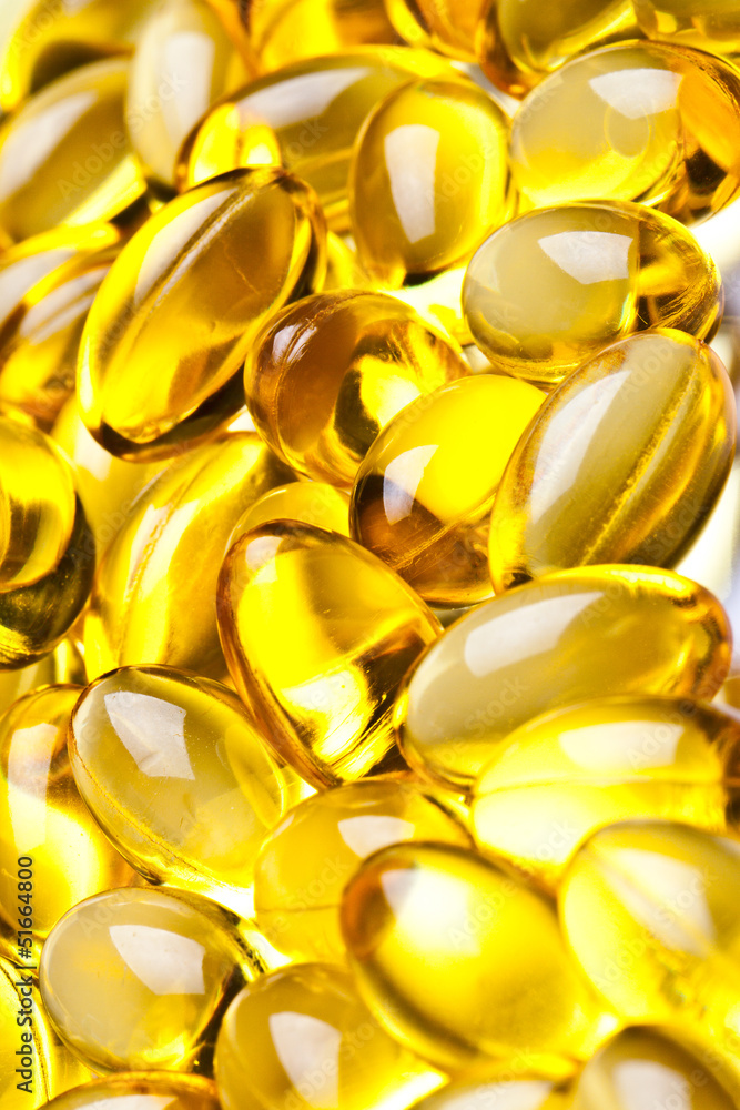 Cod liver oil omega 3 gel capsules isolated on pastel background Cod liver oil omega 3 gel capsules isolated on pastel background