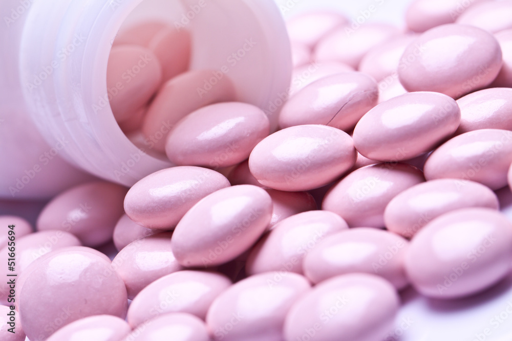 vitamin pills isolated on pastel background vitamin pills isolated on pastel background