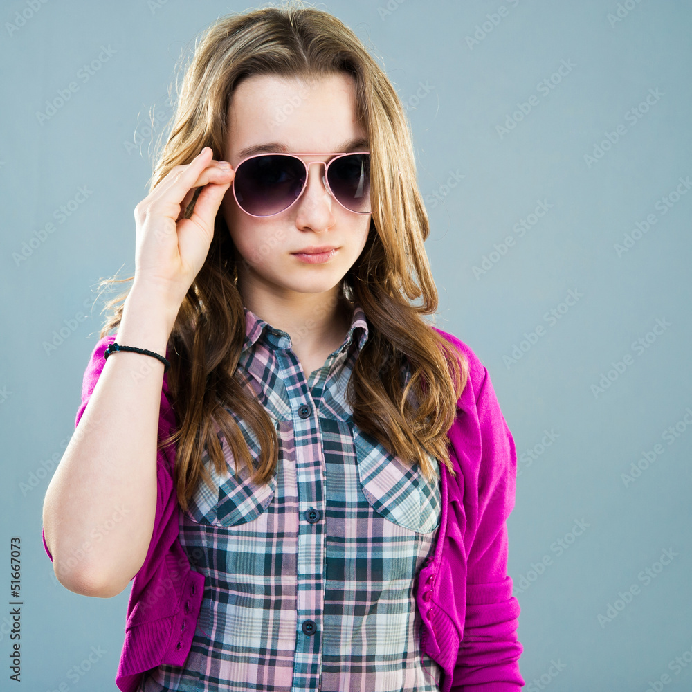 Fototapeta premium little fashion model in sunglasses