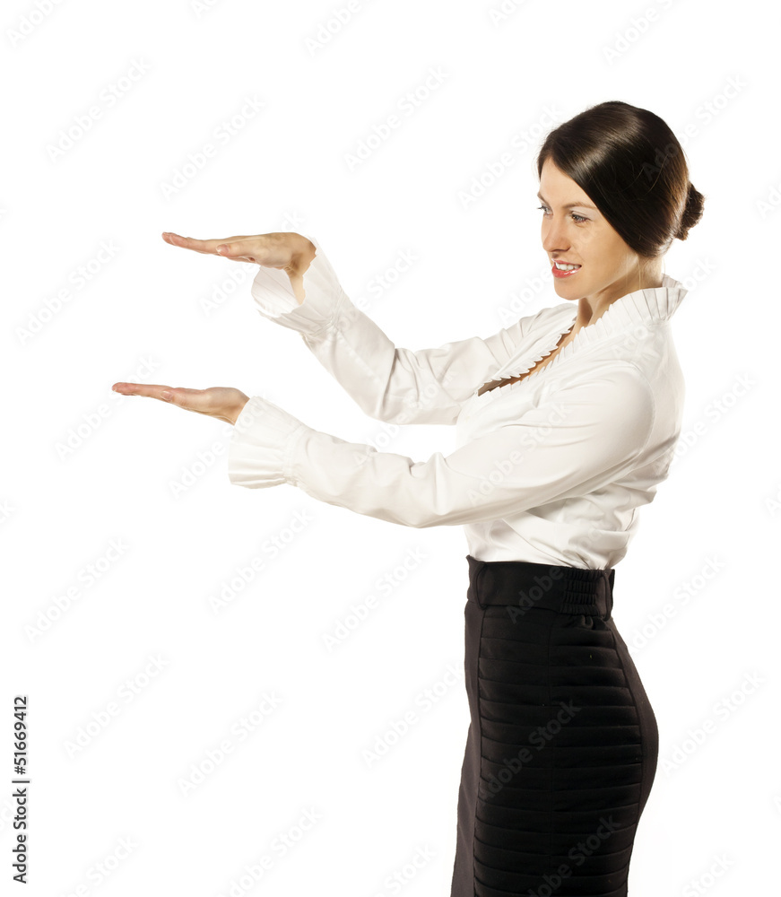 young cheerful woman in the studio shows something young cheerful woman in the studio shows something