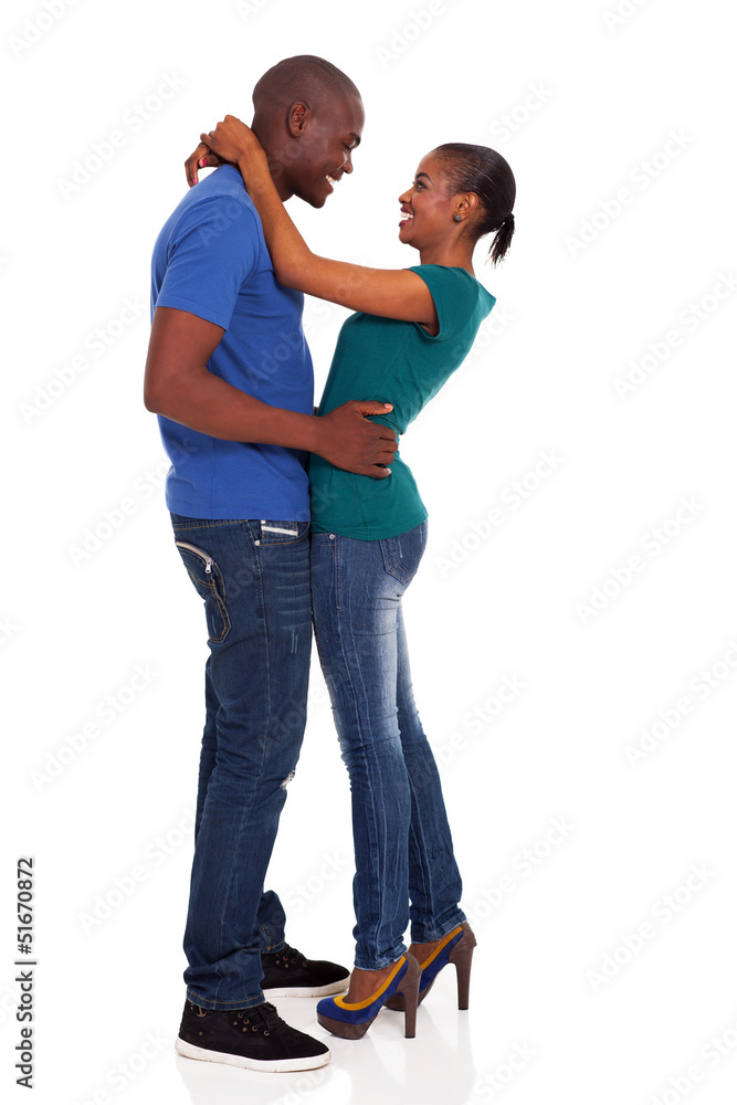 happy african young couple hugging happy african young couple hugging