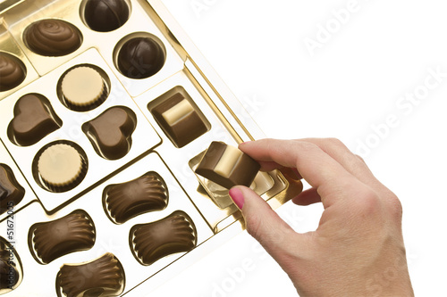 Foto Box of chocolates on a white background