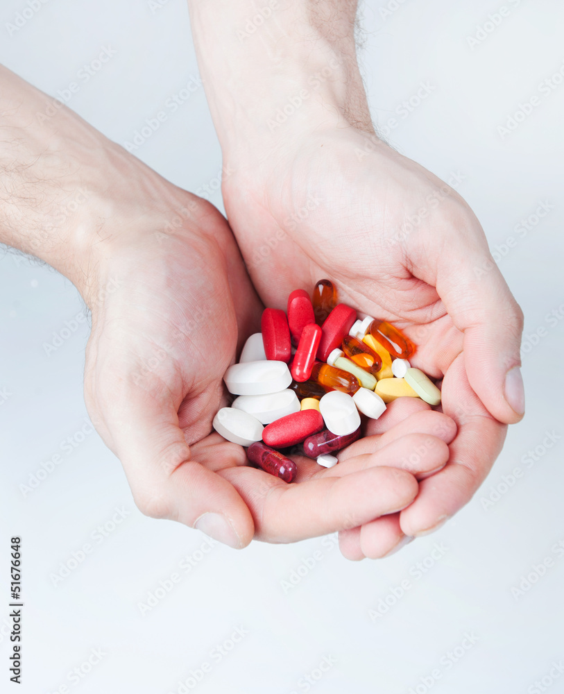 A pile of medicines in the hands of A pile of medicines in the hands of