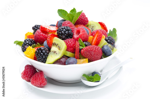 salad of fresh fruit and berries in a bowl isolated  close-up