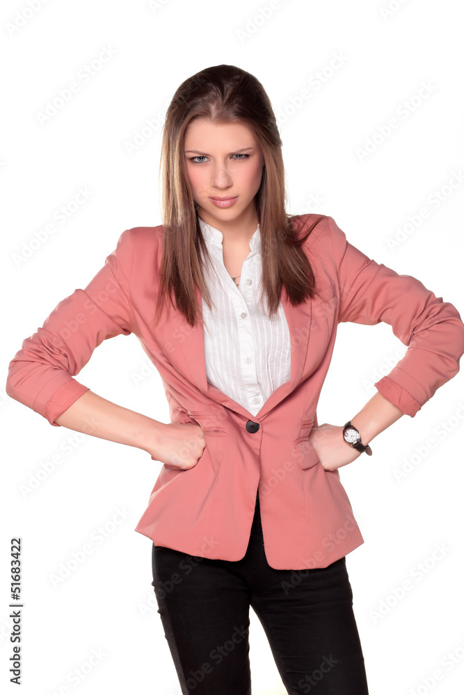 frowning and angry teenager girl with hands on the waist frowning and angry teenager girl with hands on the waist