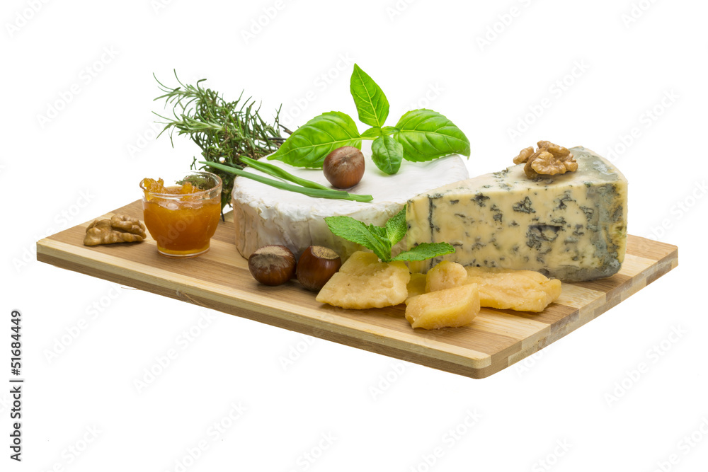 Assorted cheese - brie, dor blue and hard old yellow cheese