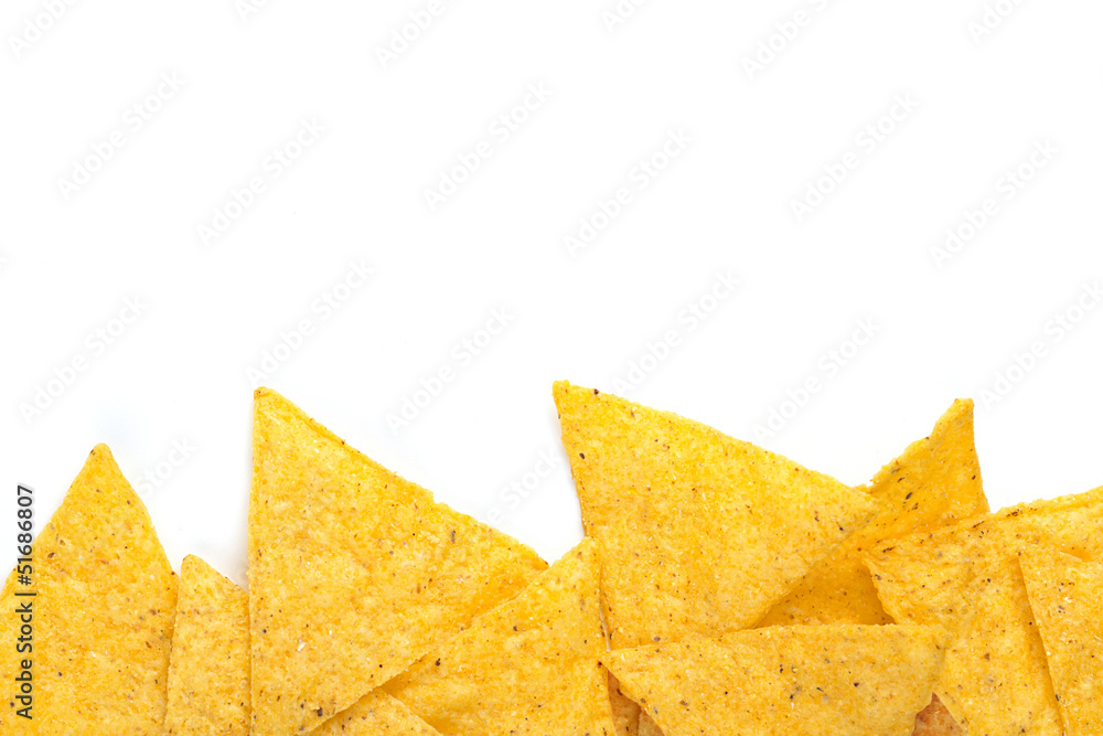 Fototapeta premium edge of tortilla chips on white background