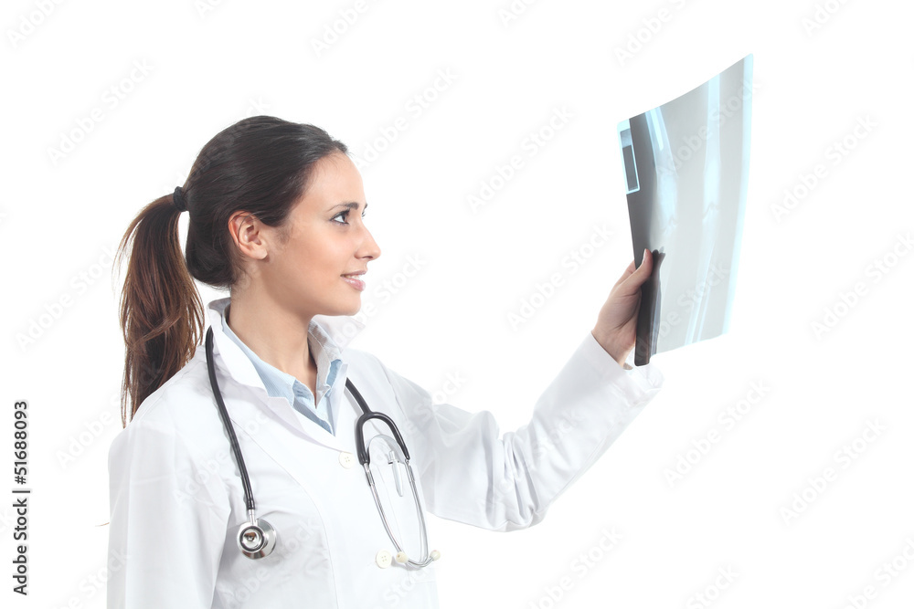 Beautiful female doctor watching a radiography Beautiful female doctor watching a radiography