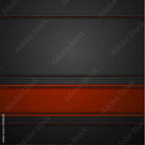 Red leather stripe on black leather background with copyspace