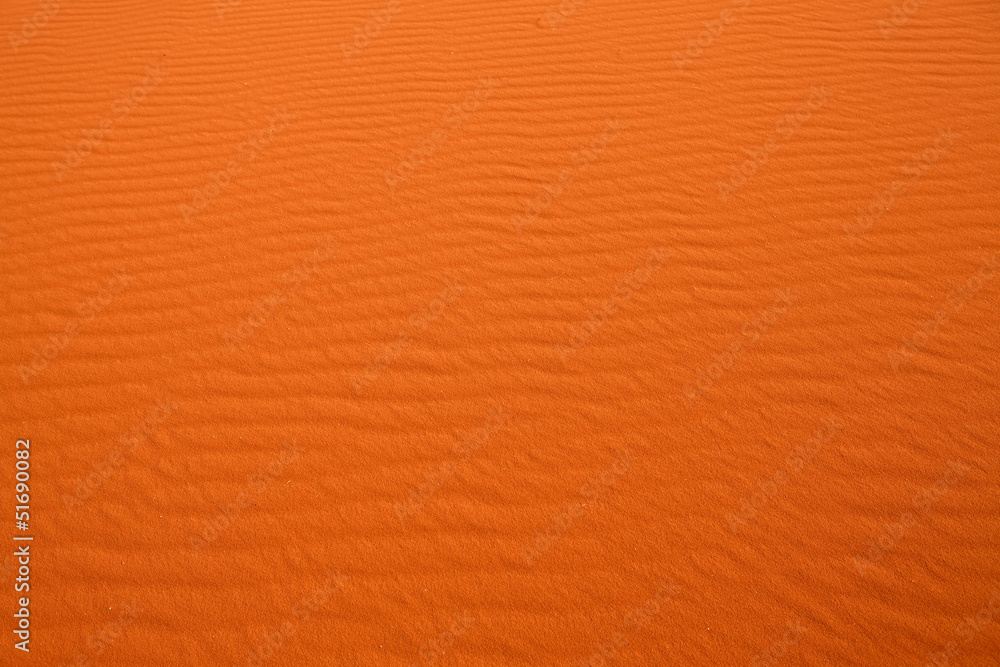 Naklejka premium Wavy sand pattern in desert