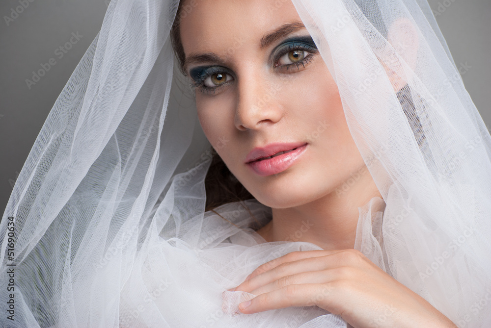 Beautiful bride with veil over her face Beautiful bride with veil over her face