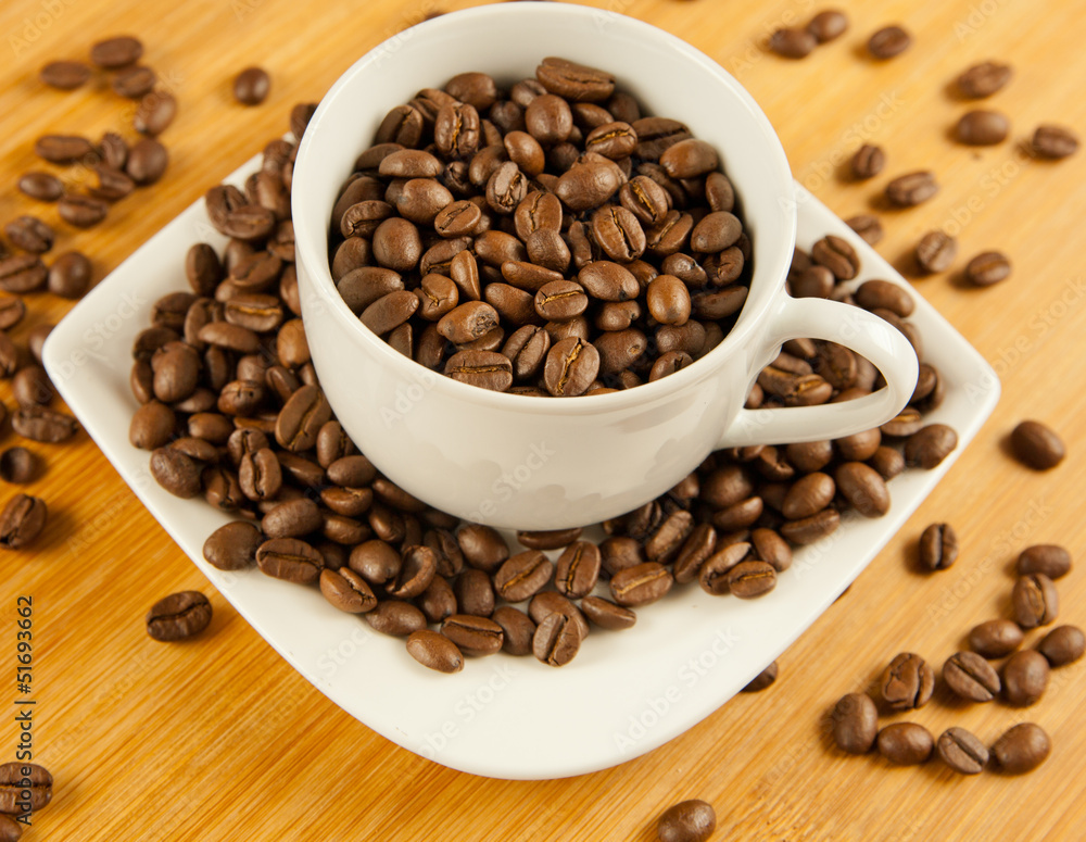 Fototapeta premium coffee beans. coffee beans in a cup.