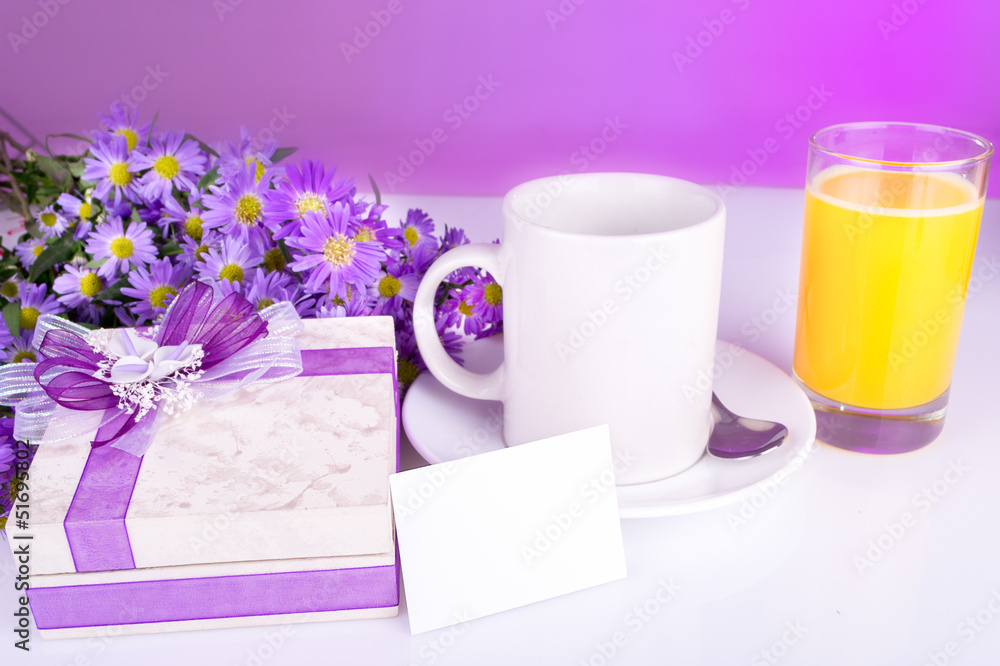 Breakfast in bed with gift and juice Breakfast in bed with gift and juice