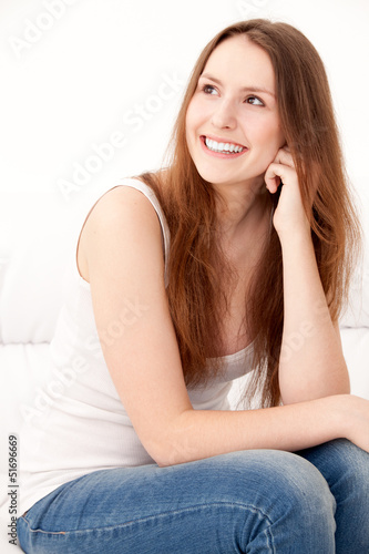 woman sitting on sofa