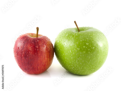 Isolated green and red apples with water drops