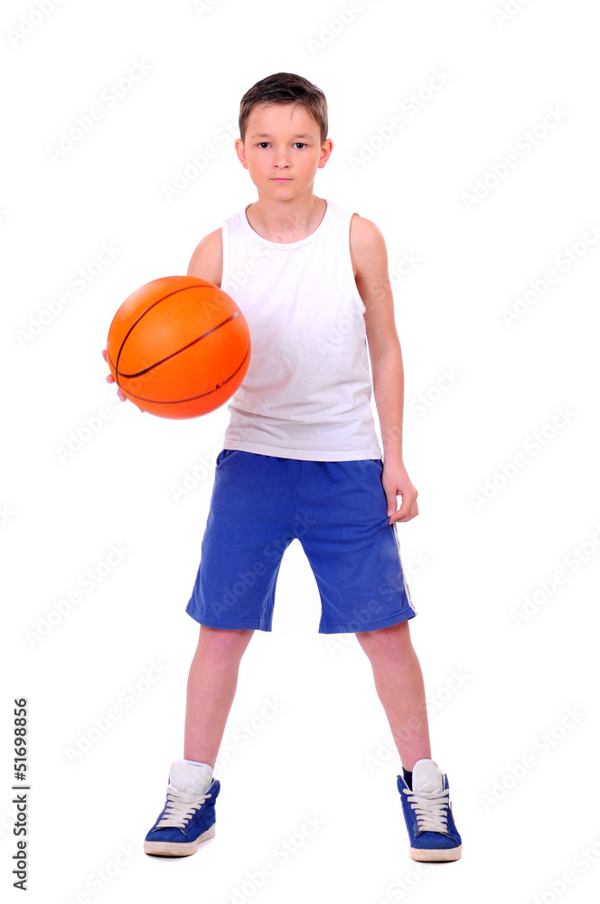 child playing basketball