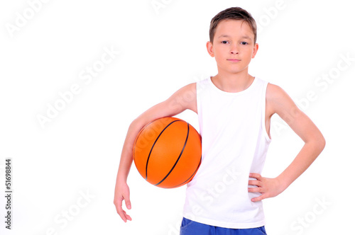 child playing basketball