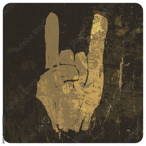 Grunge "rock on" gesture. Vector