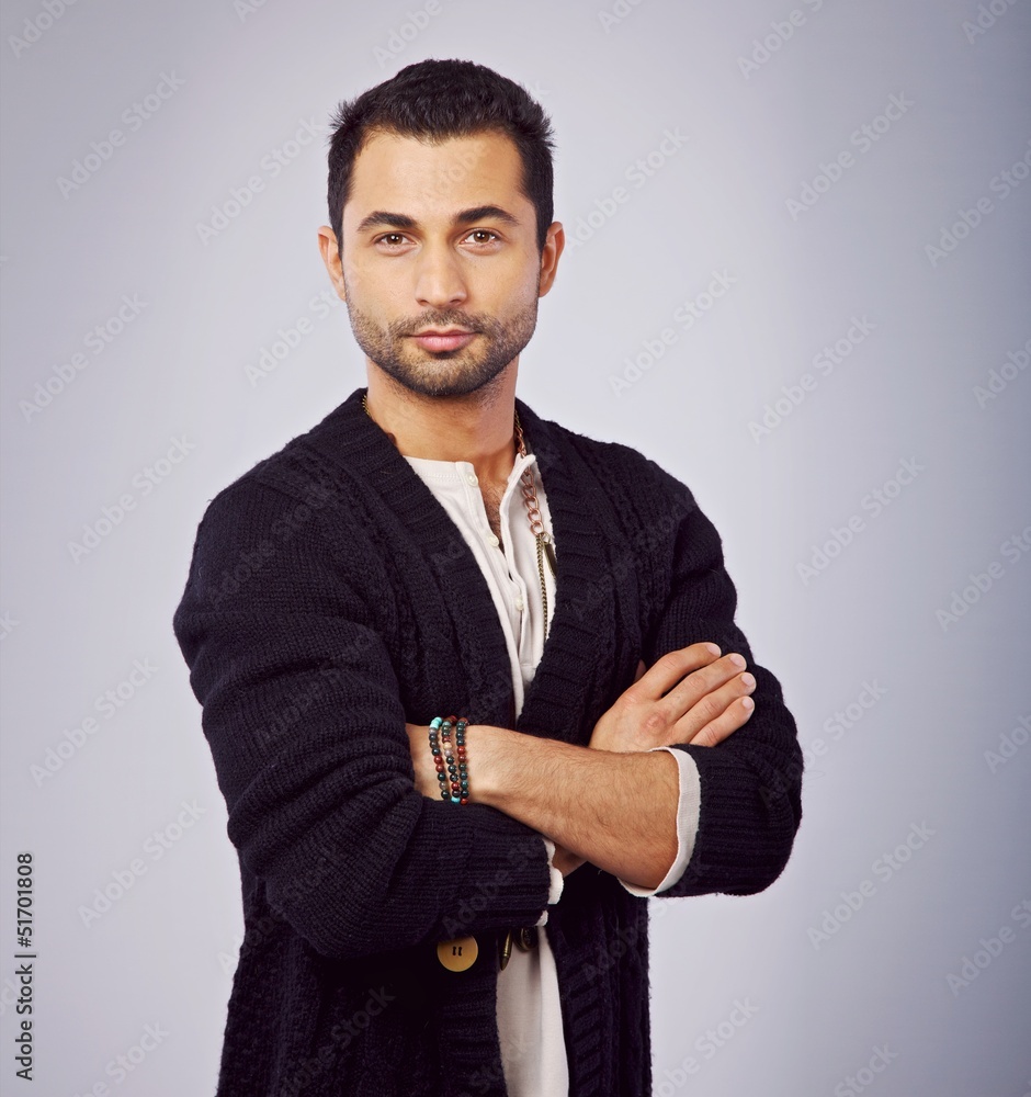 Confident Young Man with Arms Crossed Confident Young Man with Arms Crossed