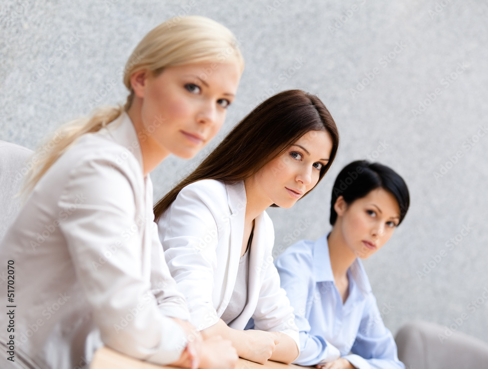 Female colleagues discuss business plan Female colleagues discuss business plan