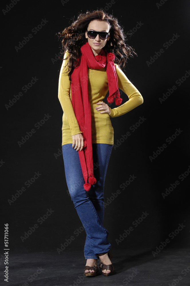 young stylish brunette in sunglasses with red scarf posing young stylish brunette in sunglasses with red scarf posing
