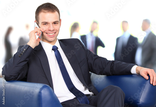 Young businessman enjoying a conversation over cellphone