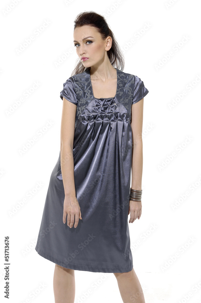 attractive young blond woman in elegant silk dress attractive young blond woman in elegant silk dress