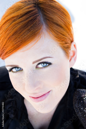 Red-haired girl with a noble appearance