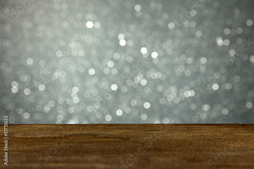 Wooden table on gray background