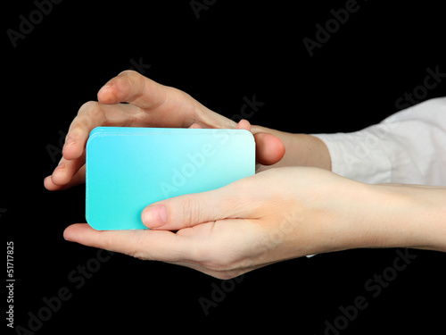 Hand with business cards. Concept: Business like poker game.