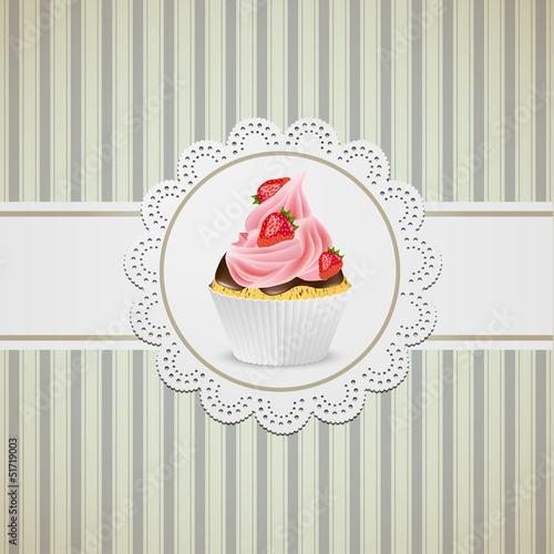Cupcake width strawberries and pink creme on lace