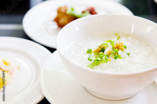 Fotografija Traditional chinese porridge rice gruel in bowl