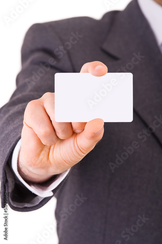 Business man showing blank card.